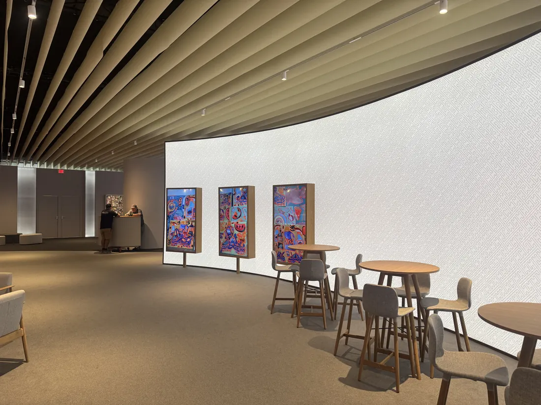 Display monitors installed in a lounge at Art Basel Miami Beach